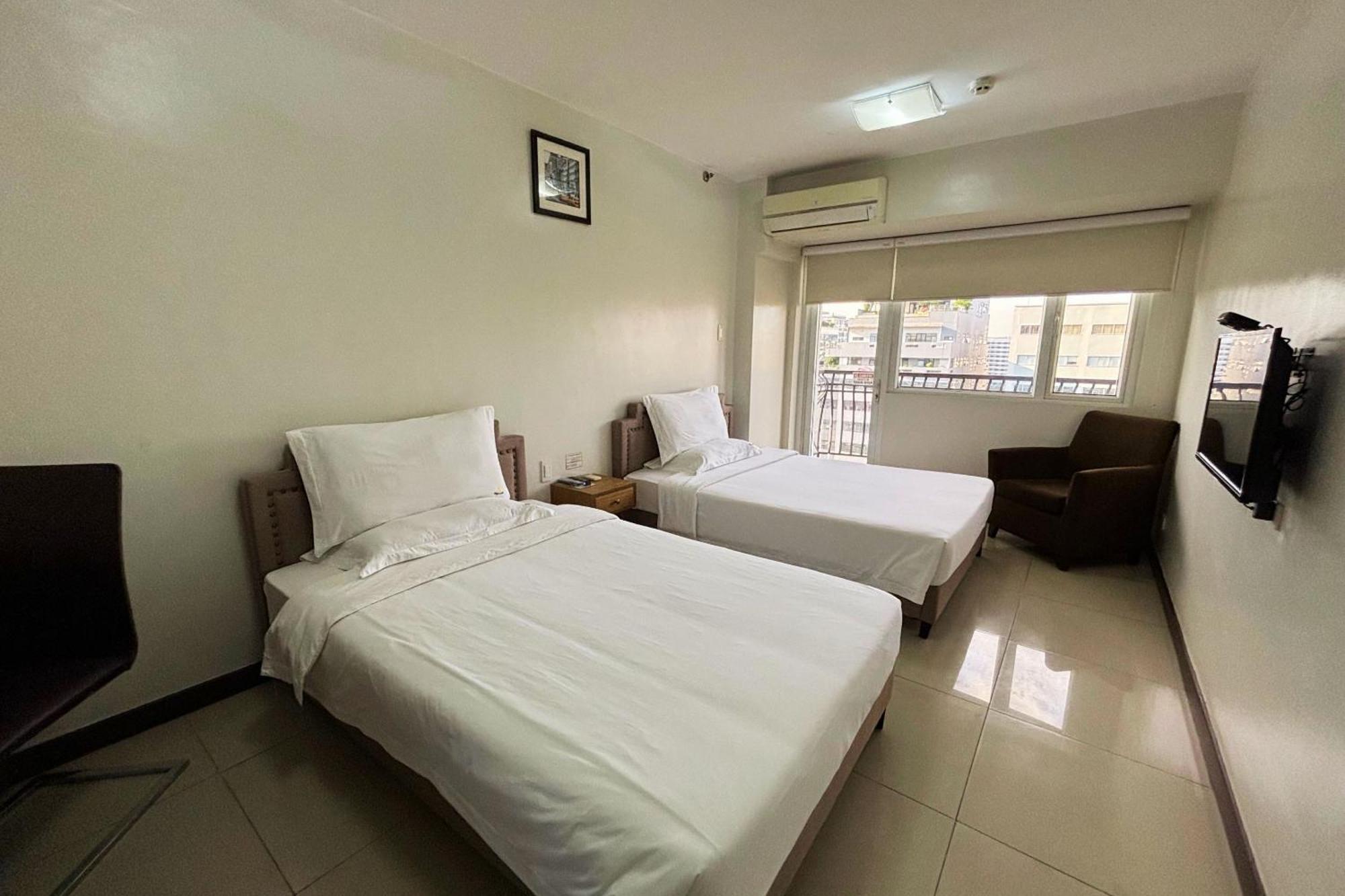 Extremeli Suites Manila Powered By Cocotel Buitenkant foto