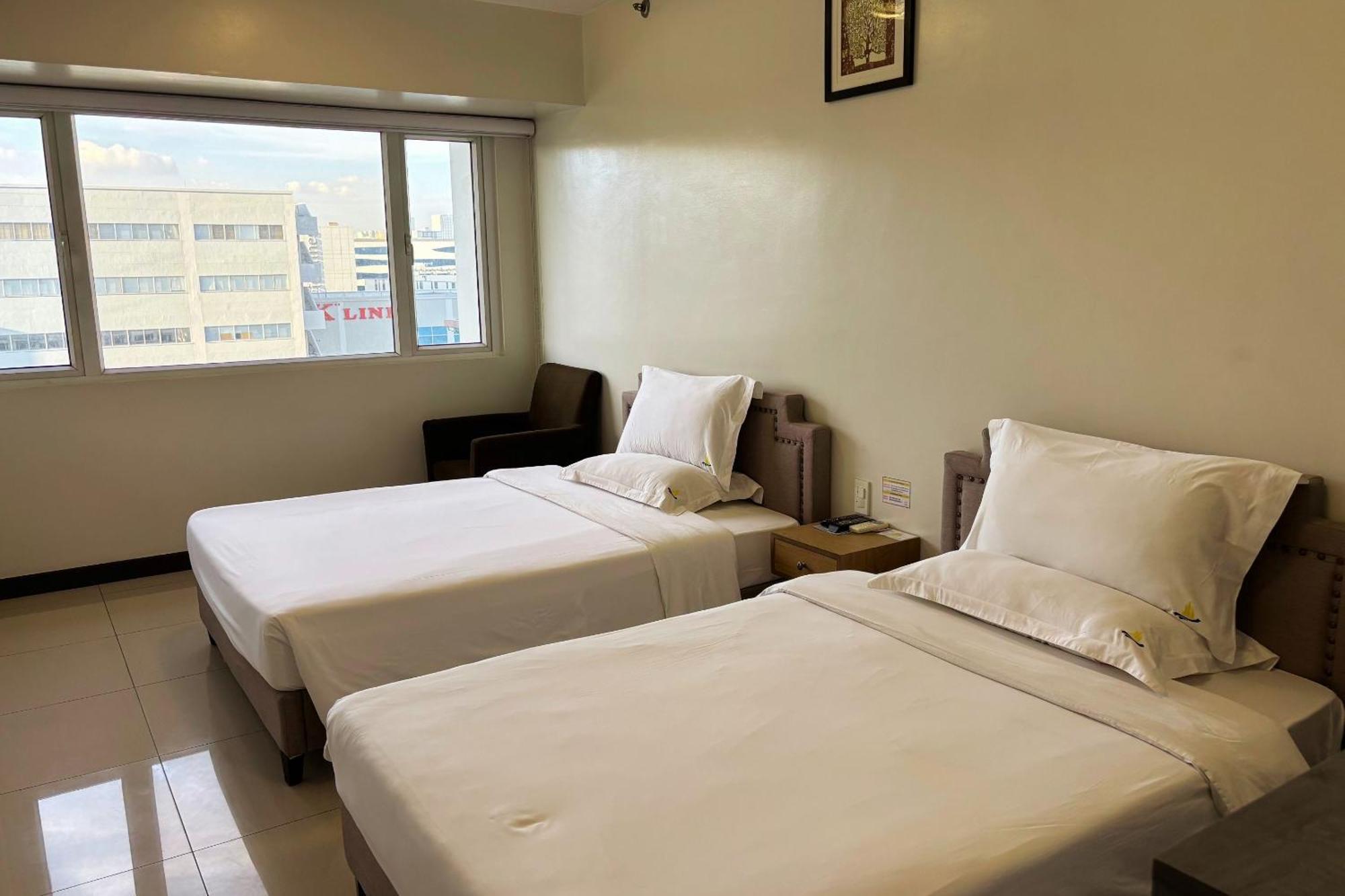 Extremeli Suites Manila Powered By Cocotel Buitenkant foto