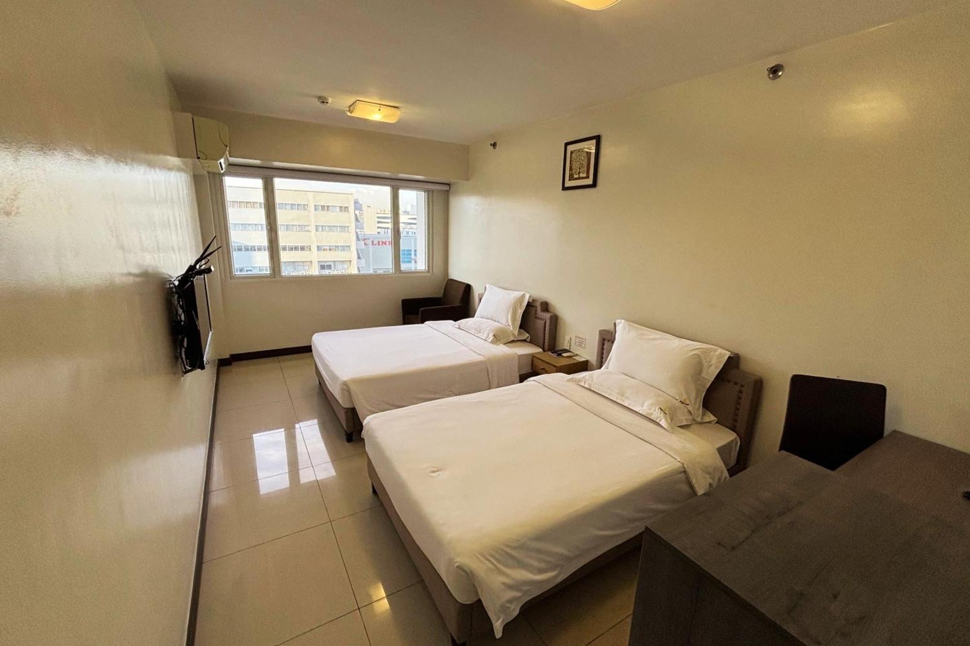 Extremeli Suites Manila Powered By Cocotel Buitenkant foto